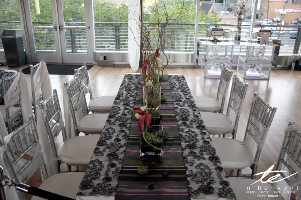 Dining Table with Florals Linens and Chiavari Chairs