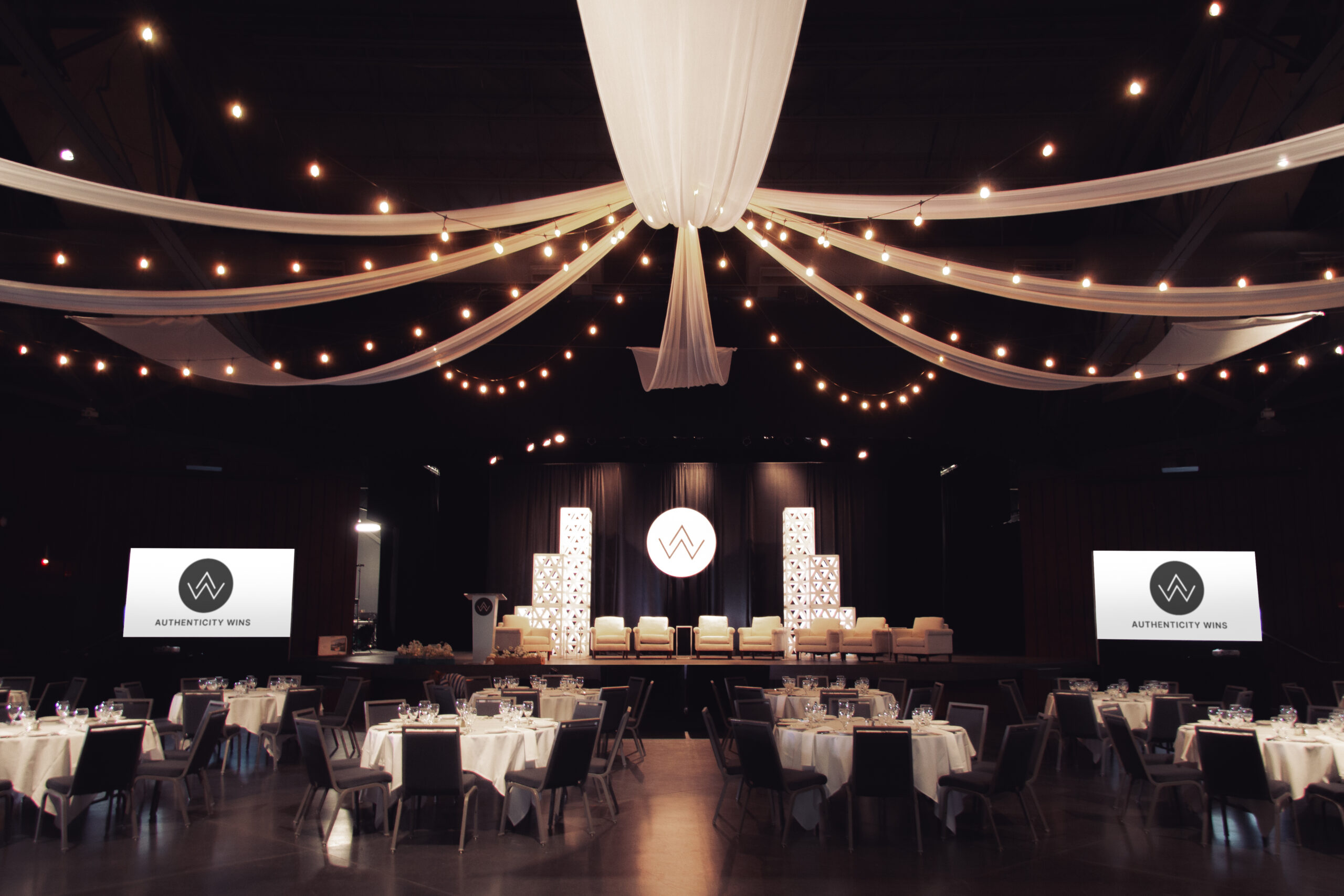 Pipe and drape stage backdrop at gala and award ceremony in Salt Lake City Utah