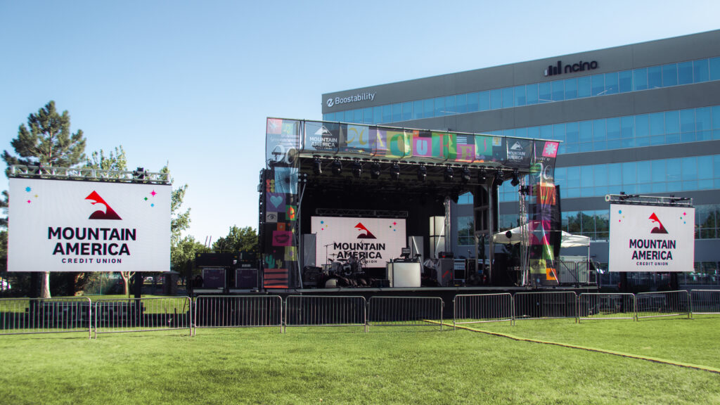 Outdoor concert stage with Mountain America Credit Union branding at MACUFest Thanksgiving Point