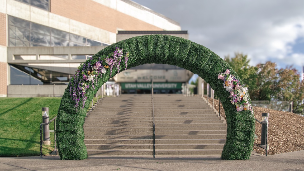 UVU President's Scholarship Ball 2025 — boxwood arch entrance, UCCU Center Orem Utah