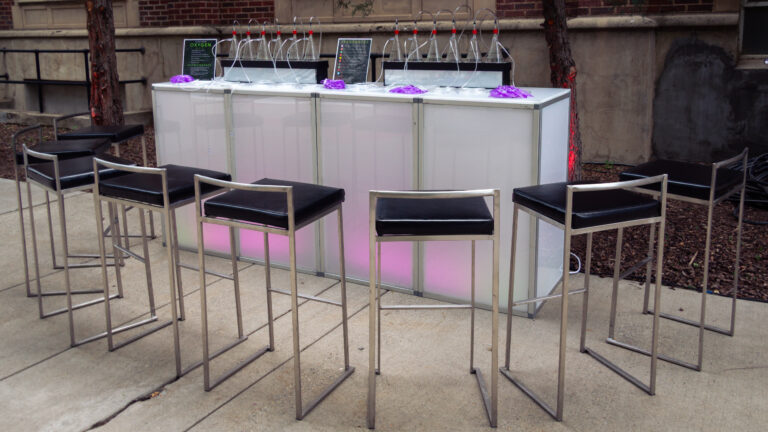 LED oxygen bar with clear tubing and modern metal barstools at Westminster University’s 150th anniversary gala