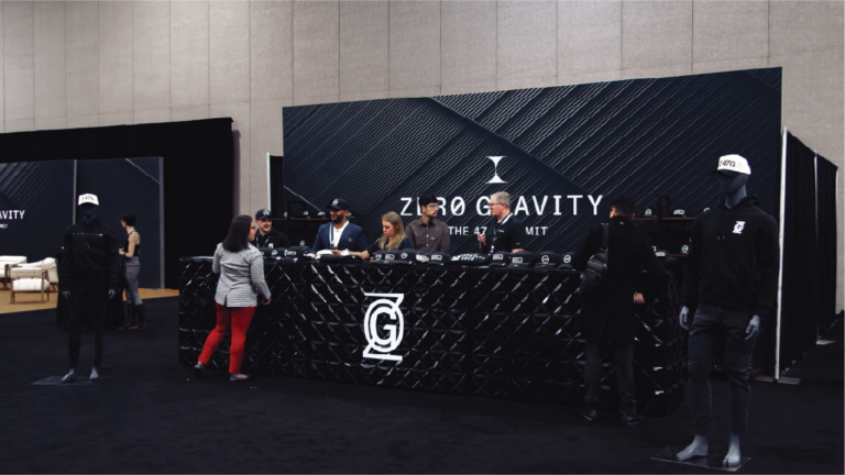 Custom graphics SEG backdrop and black teak bar swag booth for 47G Zero Gravity Summit Salt Lake City Utah by In The Event