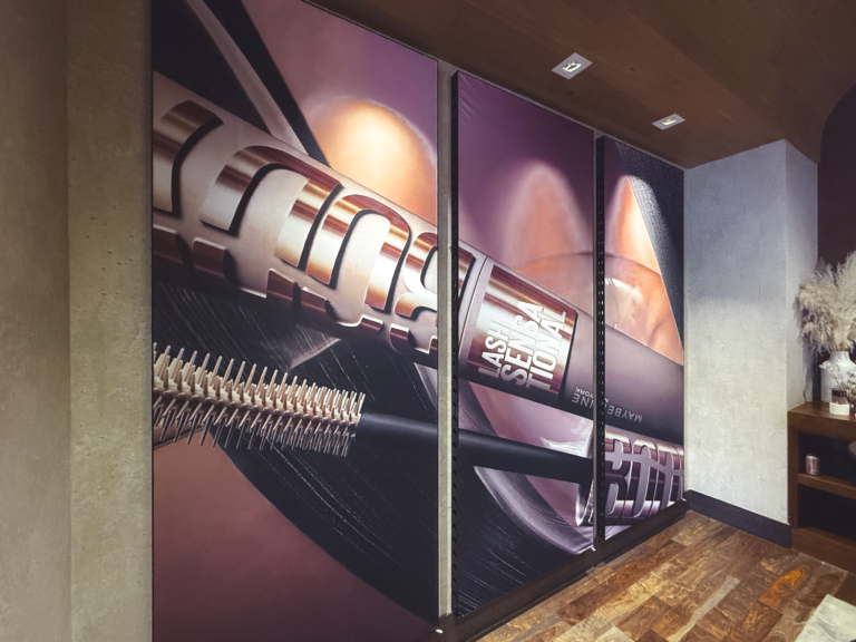 Custom SEG backdrop with Aluvision frames and branded graphics for Maybelline New York Peak Body Experience at Blue Sky Lodge in Utah by In The Event