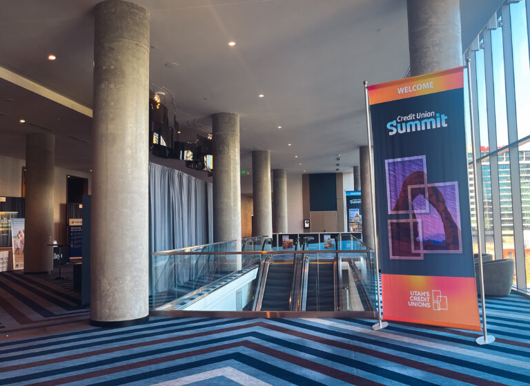 Branded event welcome banner displayed in the lobby of the Hyatt Regency Salt Lake City for the Utah Credit Union Association Credit Union Summit.