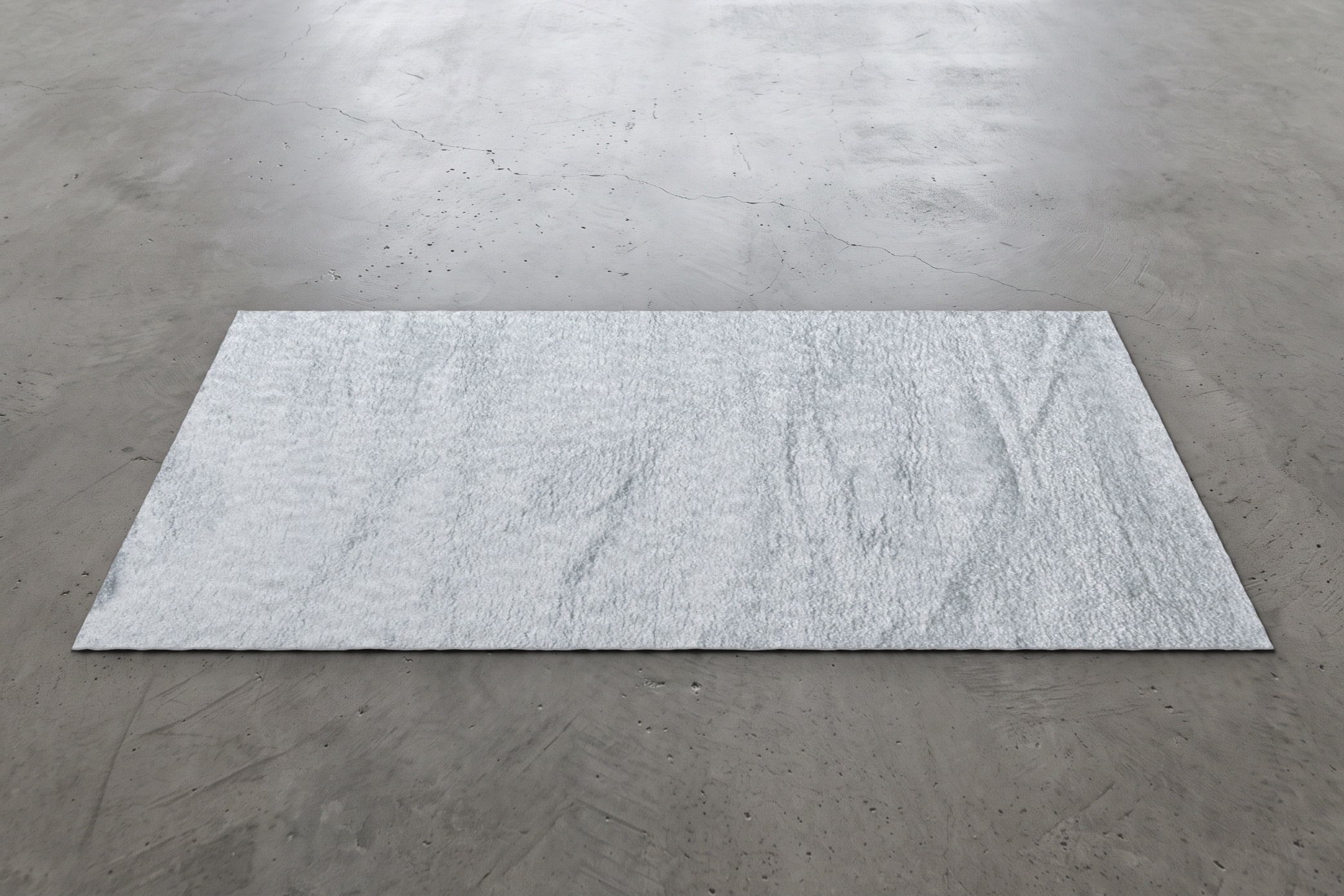 Plush white event carpet measuring 8 by 16 feet, shown on a concrete floor