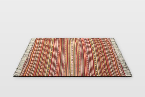 Red, orange, gold and cream striped Navajo-style event rug with fringed ends, isolated studio render