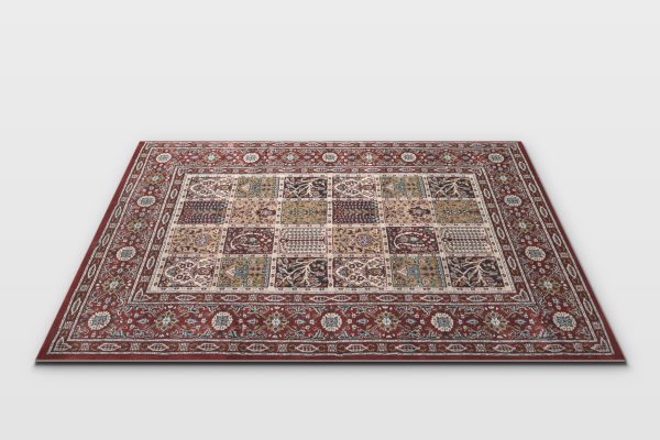 Red event rug with paisley squares and an ornate border, measuring 6.5 by 4.5 feet, isolated studio render