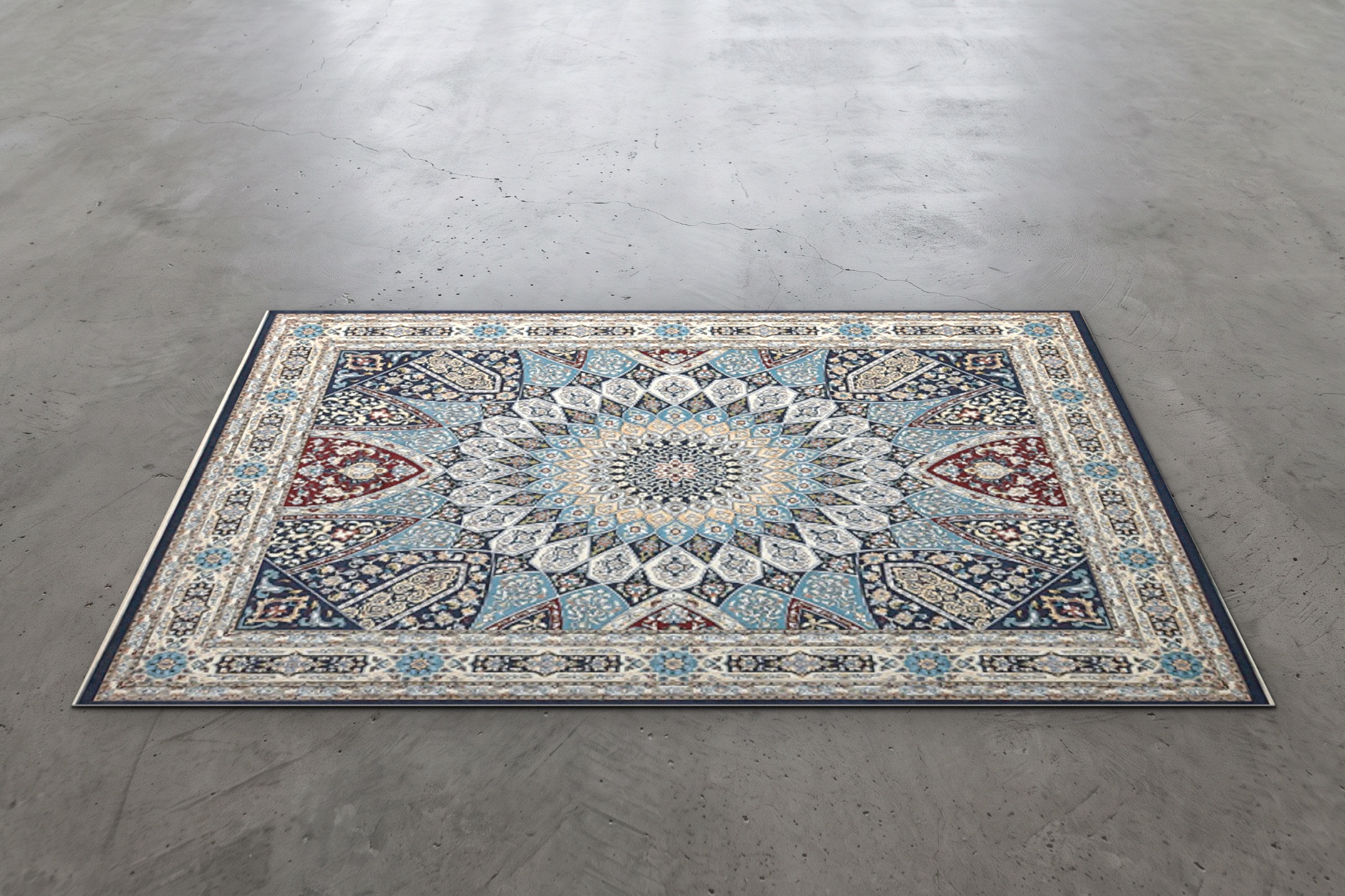 Ivory and blue star medallion event rug with red accents, measuring 20 by 12 feet, shown on a concrete floor