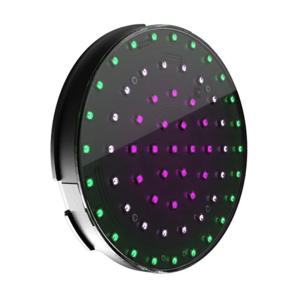 Angled view of a Nexus Circle LED panel with green and magenta pixels lit